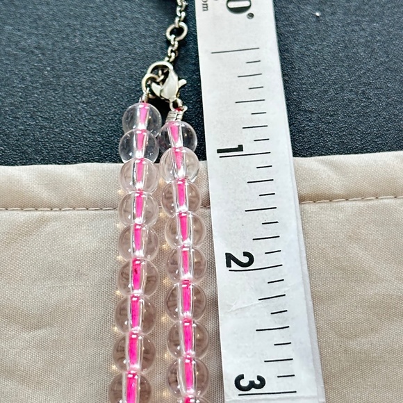 Graduating clear glass bead necklace strung on hot pink string. Lobster clasp - Picture 6 of 13